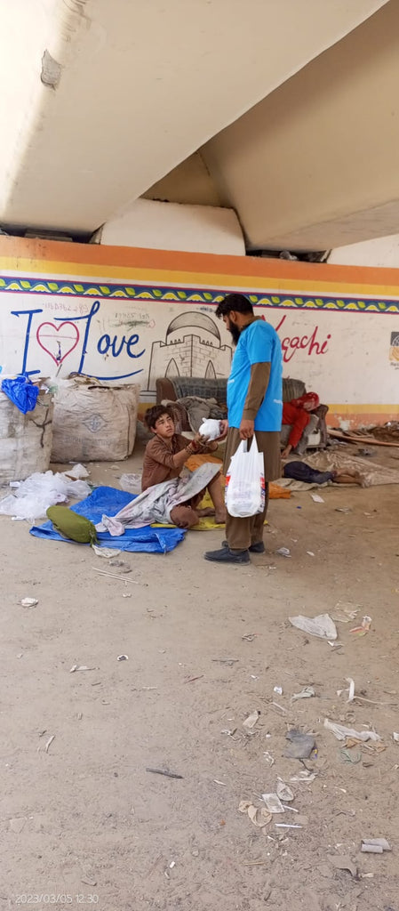 Karachi, Pakistan - Participating in Mobile Food Rescue Program by Distributing Hot Meals & Water Bottles to Local Community's Homeless & Less Privileged People