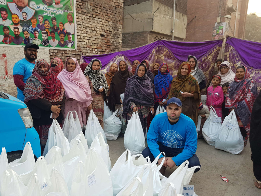 Lahore, Pakistan - Participating in Mobile Food Rescue Program by Distributing Monthly Ration to Local Community's 60+ Less Privileged Families