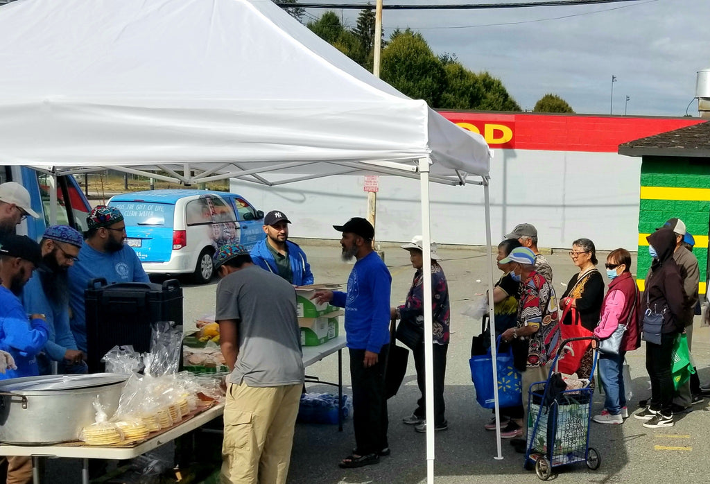 Vancouver, Canada - Participating in Mobile Food Rescue Program by Serving Hot Meals and Snacks & Distributing Essential Groceries to Local Community's Less Privileged People