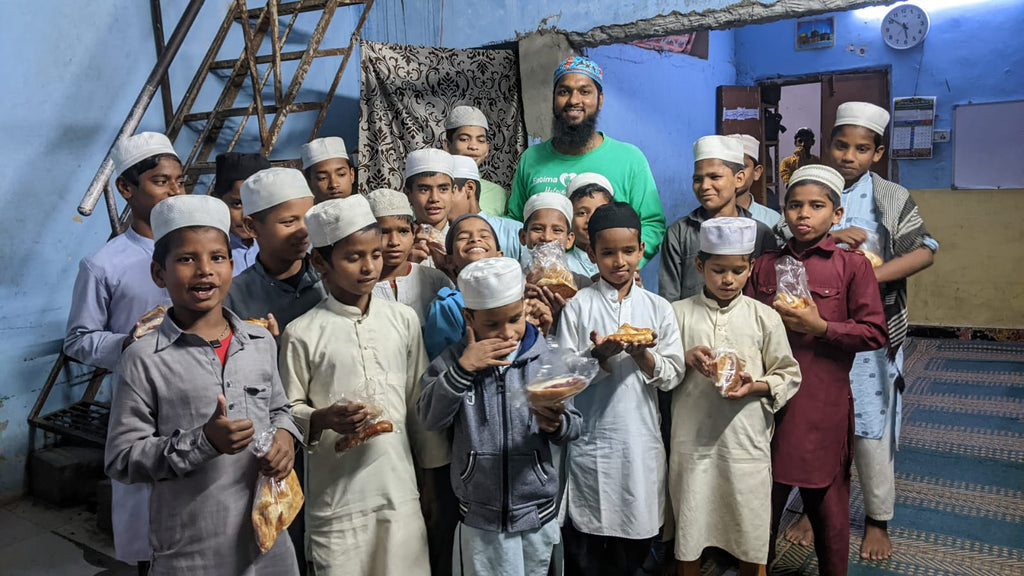 Hyderabad, India - Participating in Mobile Food Rescue Program by Distributing Bakery Sweets & Snacks to Local Community's Madrasa/School Children & Less Privileged Families
