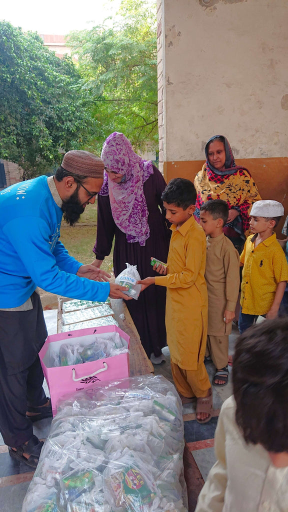 Faisalabad, Pakistan - Participating in Orphan Support Program & Mobile Food Rescue Program by Distributing 100+ Goodie Bags with Snacks & Juice to Beloved Orphans at Local Community's Orphanage