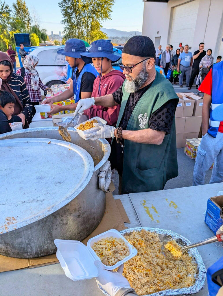 Vancouver, Canada - Participating in Mobile Food Rescue Program by Serving Hot Meals with Cold Drinks & Distributing Essential Groceries & Essential Supplies to Less Privileged Families at Local Community's Muslim Food Bank