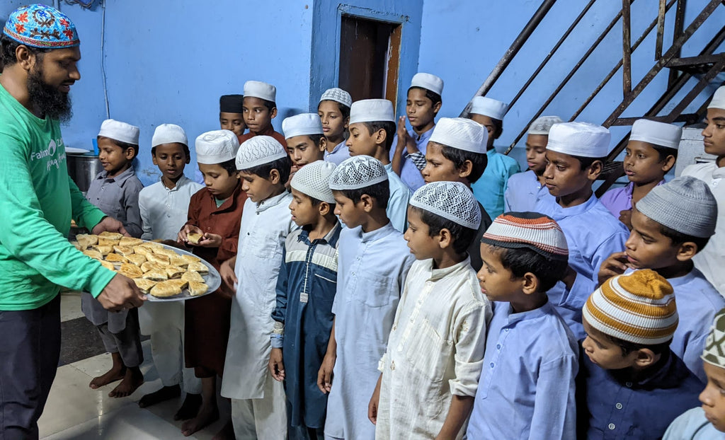 Hyderabad, India - Honoring Fourth Day of Holy Month of Muharram by Serving Bakery Snacks & Hot Dinners to Madrasa/School Children