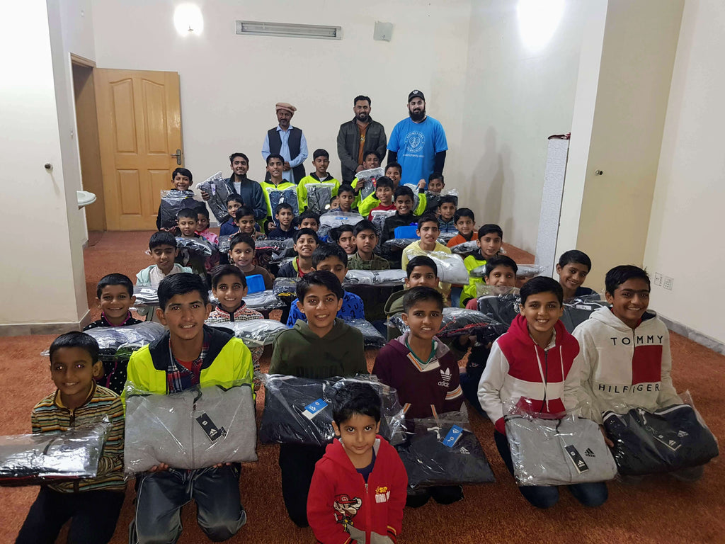 Lahore, Pakistan - Participating in Orphan Support Program by Distributing 200+ Winter Track Suits to Beloved Orphans at Four Local Community Orphanages