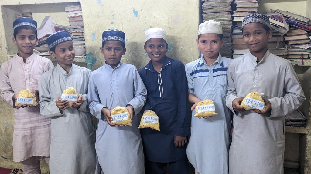 Hyderabad, India - Participating in Mobile Food Rescue Program by Distributing Hot Meals to Local Community's Madrasa/School Children